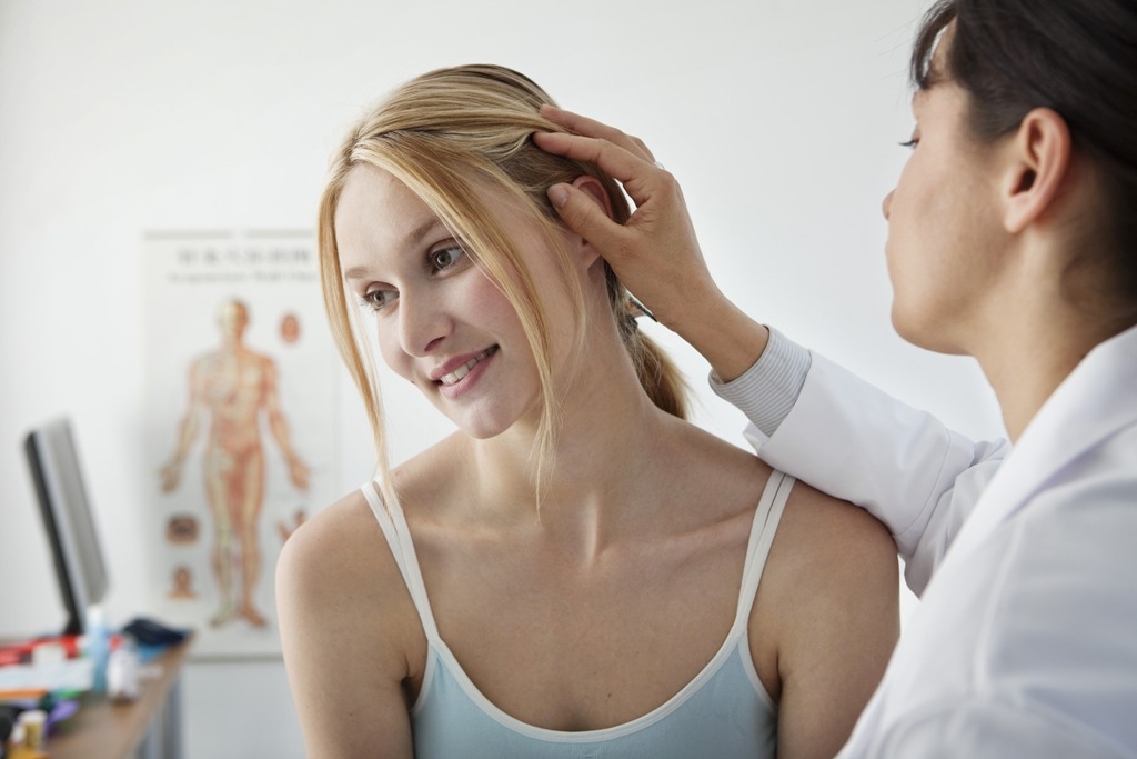 Woman consults a doctor